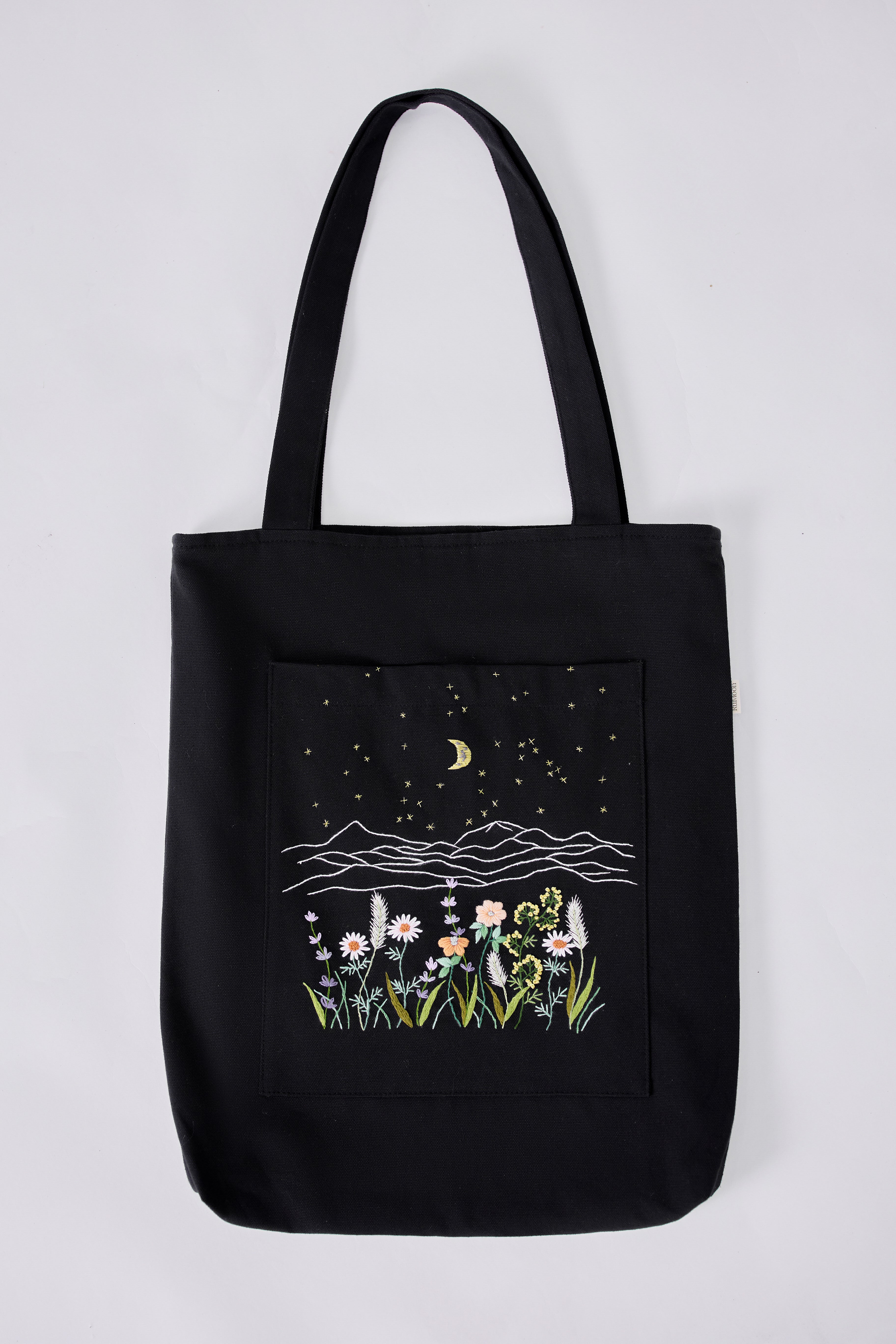 Mountain Flower Field Embroidery Tote Bag Black