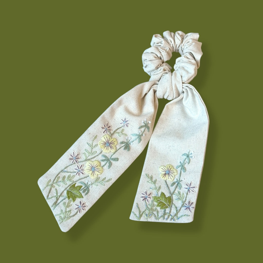 Rustic Vibe Hand Embroidery Scrunchies with long linen tails featuring delicate floral designs. Ideal hair accessory gift for women and flower girls.