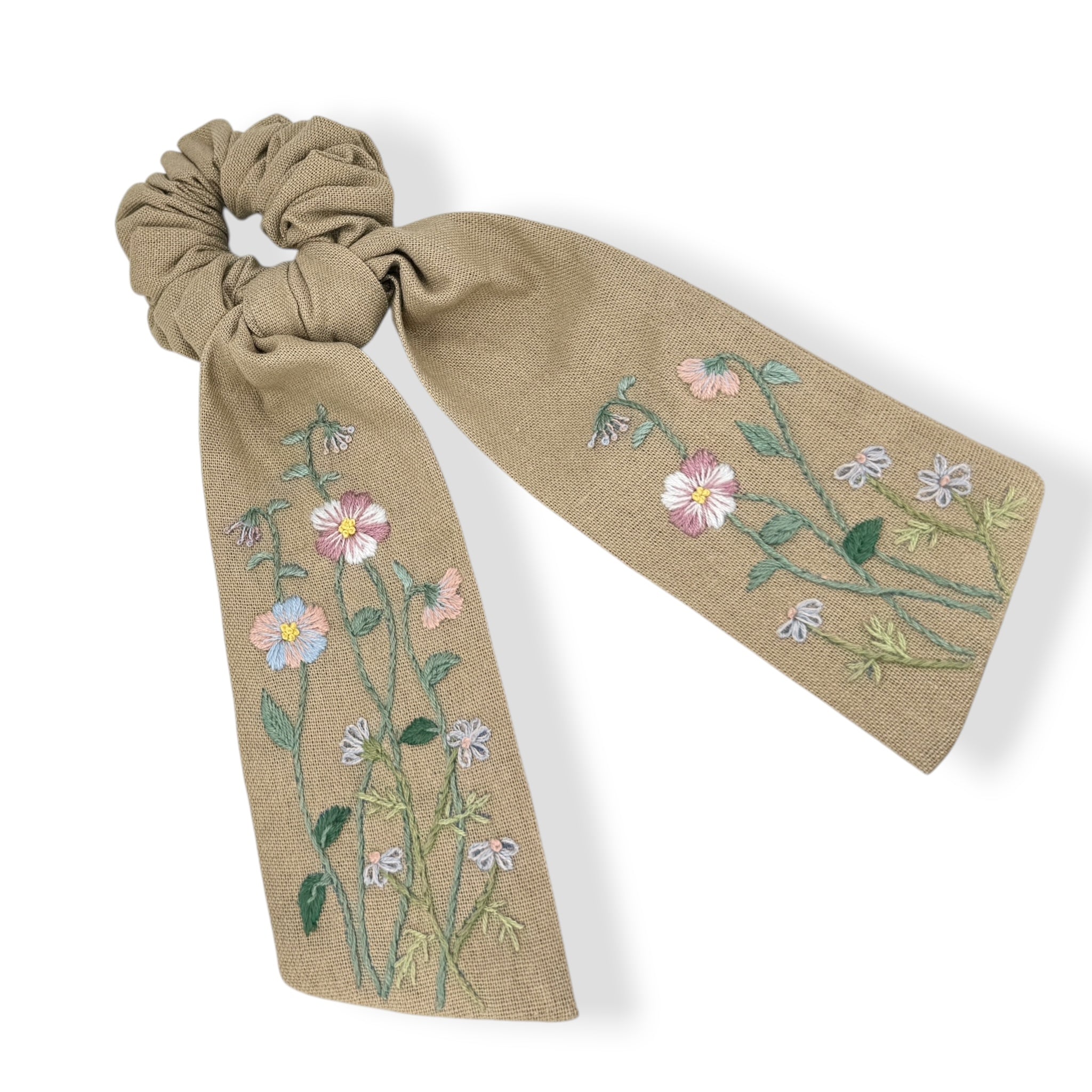 Floral hand embroidered scrunchie with long tail in soft beige linen, perfect flower girl proposal gift or stylish hair clip for her.
